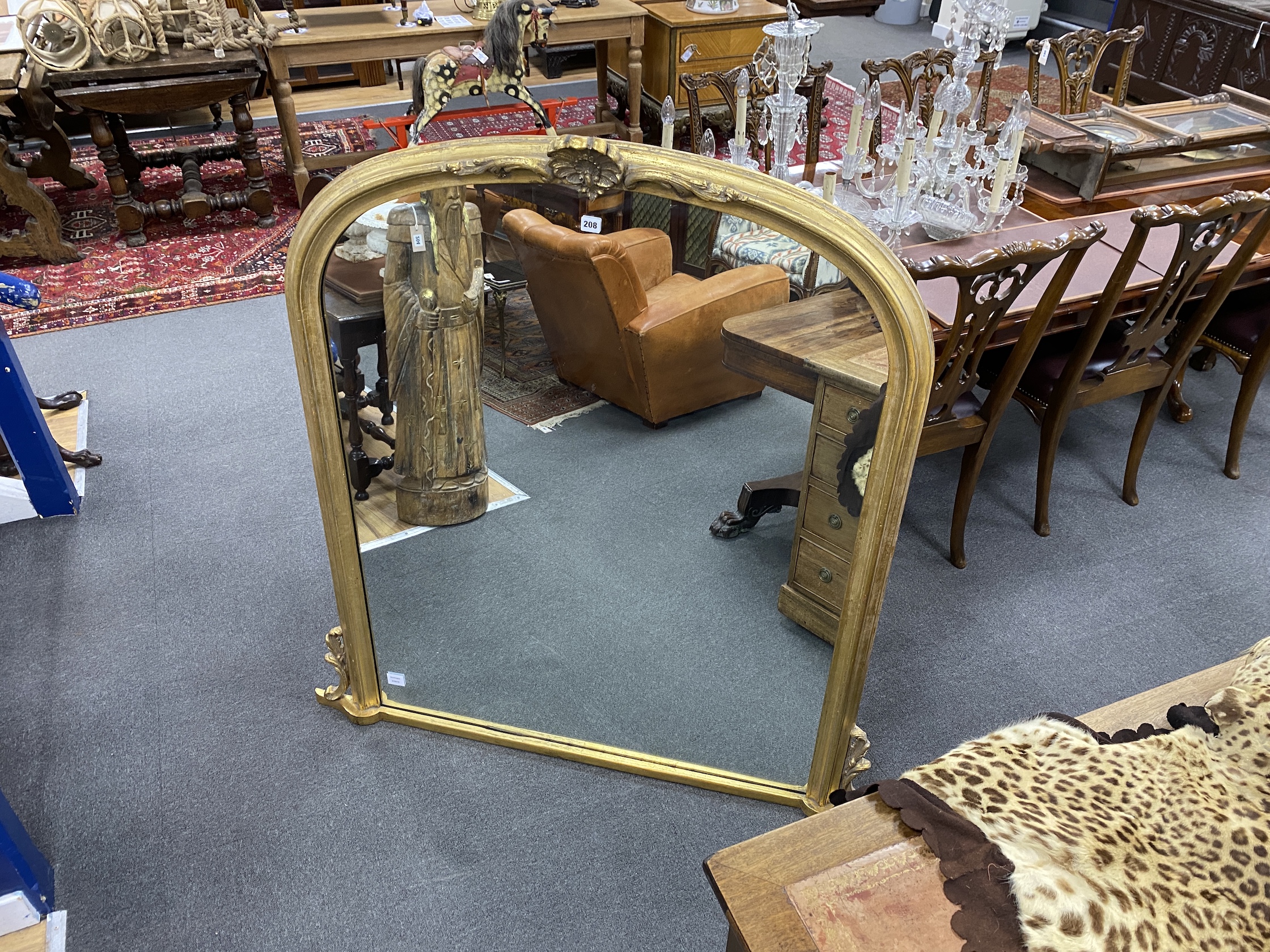 A Victorian style gilt composition overmantel mirror, width 114cm, height 137cm